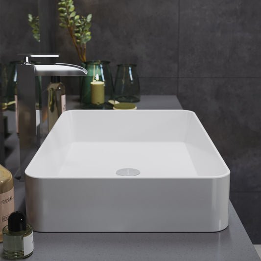 24-inch white rectangular ceramic vessel sink with flat edges and modern design.