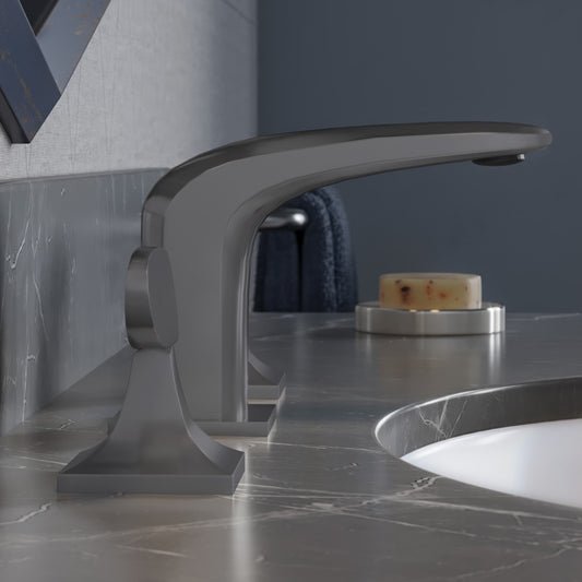 Widespread bathroom faucet in gunmetal gray with two handles and a sleek, modern design.