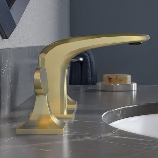 Widespread bathroom faucet in brushed gold with two handles and curved spout design.