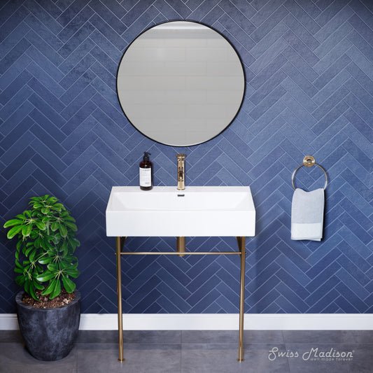 White ceramic console sink with gold legs, modern rectangular basin with single faucet hole.