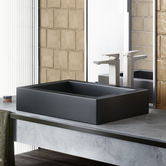 Rectangular vessel sink in matte black ceramic, modern minimalist design.